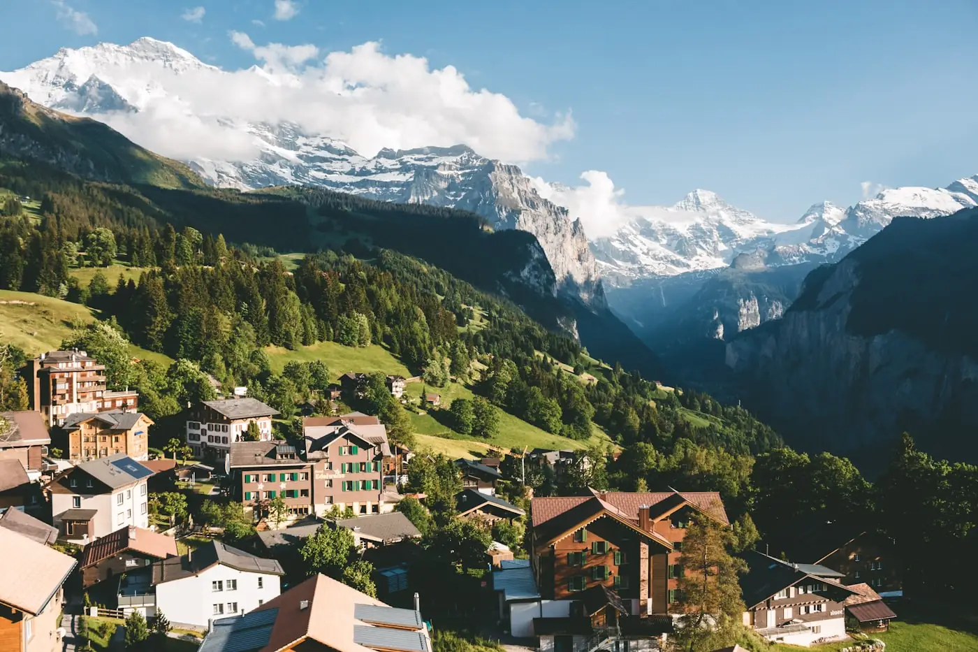 A Swiss alpine village beneath snow-capped peaks